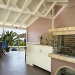 Athinais Vila *